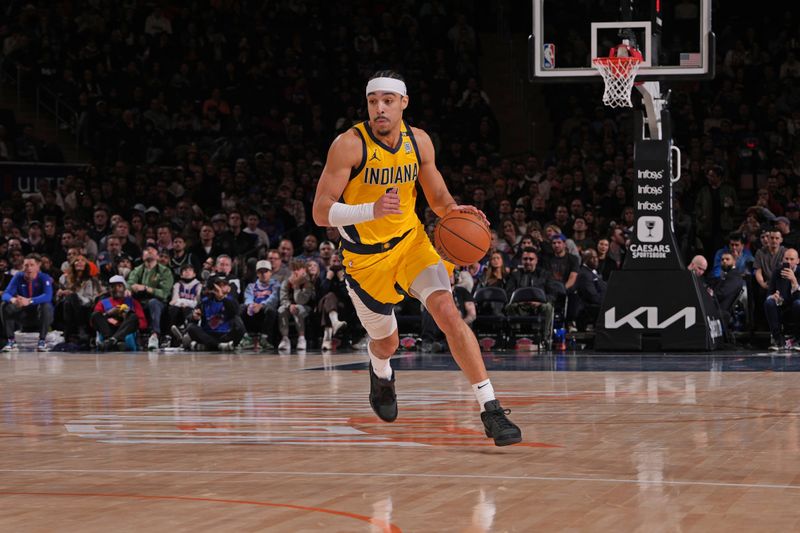 NEW YORK, NY - FEBRUARY 10: Andrew Nembhard #2 of the Indiana Pacers dribbles the ball during the game against the New York Knicks on February 10, 2024 at Madison Square Garden in New York City, New York.  NOTE TO USER: User expressly acknowledges and agrees that, by downloading and or using this photograph, User is consenting to the terms and conditions of the Getty Images License Agreement. Mandatory Copyright Notice: Copyright 2024 NBAE  (Photo by Jesse D. Garrabrant/NBAE via Getty Images)