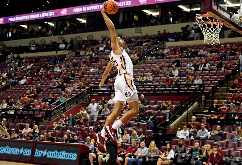 Feb 11, 2023; Tallahassee, Florida, USA; Florida State Seminoles guard Matthew Cleveland (35) dunks the ball during the first half of the game against the Pittsburgh Panthers at Donald L. Tucker Center. Mandatory Credit: Melina Myers-USA TODAY Sports