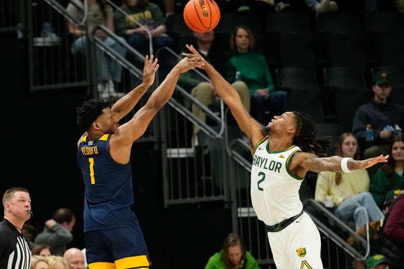 Feb 15, 2025; Waco, Texas, USA; West Virginia Mountaineers guard Joseph Yesufu (1) shoots and is fouled by Baylor Bears guard Jayden Nunn (2) during the first half at Paul and Alejandra Foster Pavilion. Mandatory Credit: Chris Jones-Imagn Images