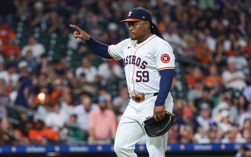 Jul 10, 2024; Houston, Texas, USA; Houston Astros starting pitcher Framber Valdez (59) walks off the mound after pitcing during the seventh inning against the Miami Marlins at Minute Maid Park. Mandatory Credit: Troy Taormina-USA TODAY Sports