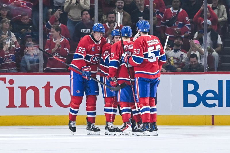 Sep 25, 2025; Montreal, Quebec, CAN; Montreal Canadiens right wing Patrik Laine (92) celebrates his goal against the Toronto Maple Leafs with his teammates during the second period at Bell Centre. Mandatory Credit: David Kirouac-Imagn Images
