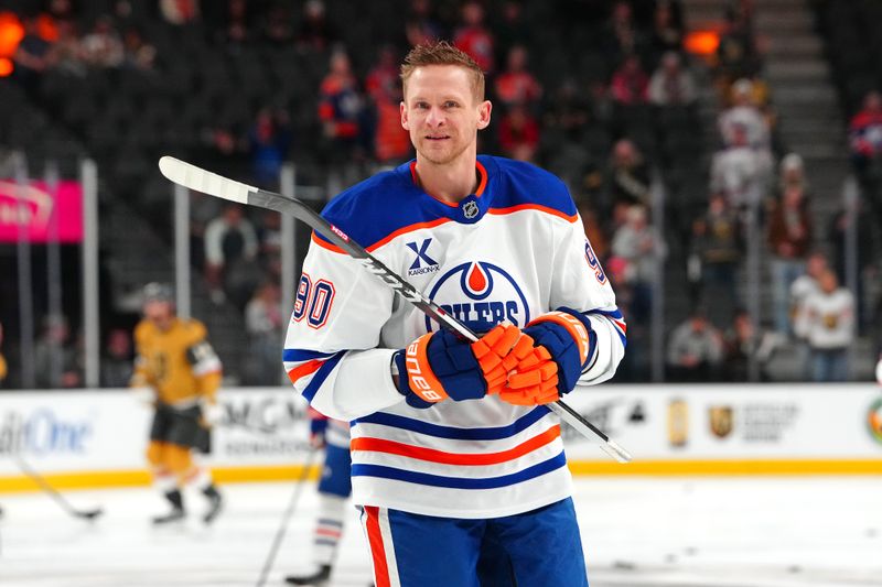 Dec 3, 2024; Las Vegas, Nevada, USA; Edmonton Oilers right wing Corey Perry (90) warms up before a game against the Vegas Golden Knights at T-Mobile Arena. Mandatory Credit: Stephen R. Sylvanie-Imagn Images