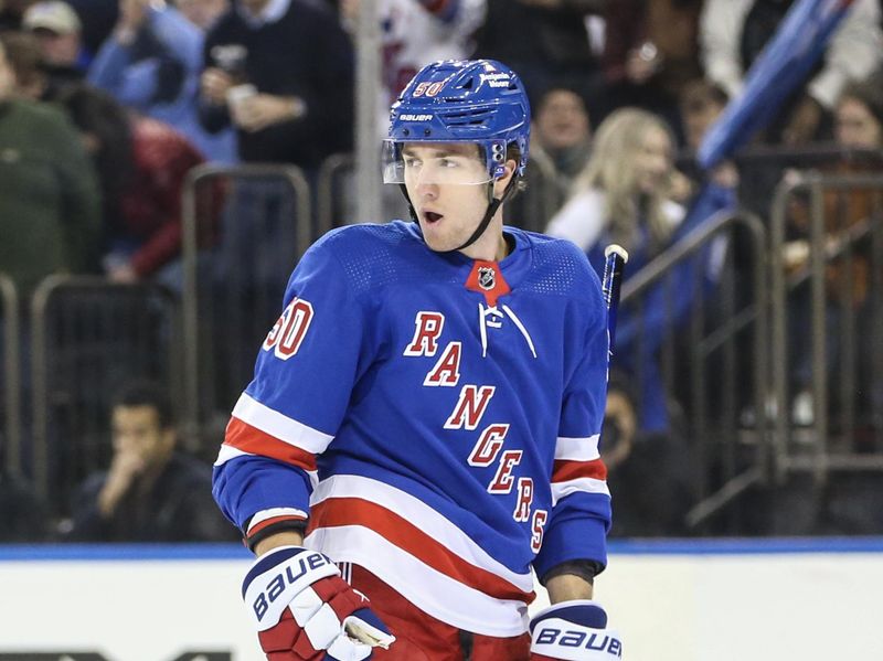 Feb 15, 2024; New York, New York, USA; New York Rangers left wing Will Cuylle (50) celebrates after scoring a goal in the second period against the Montreal Canadiens at Madison Square Garden. Mandatory Credit: Wendell Cruz-USA TODAY Sports