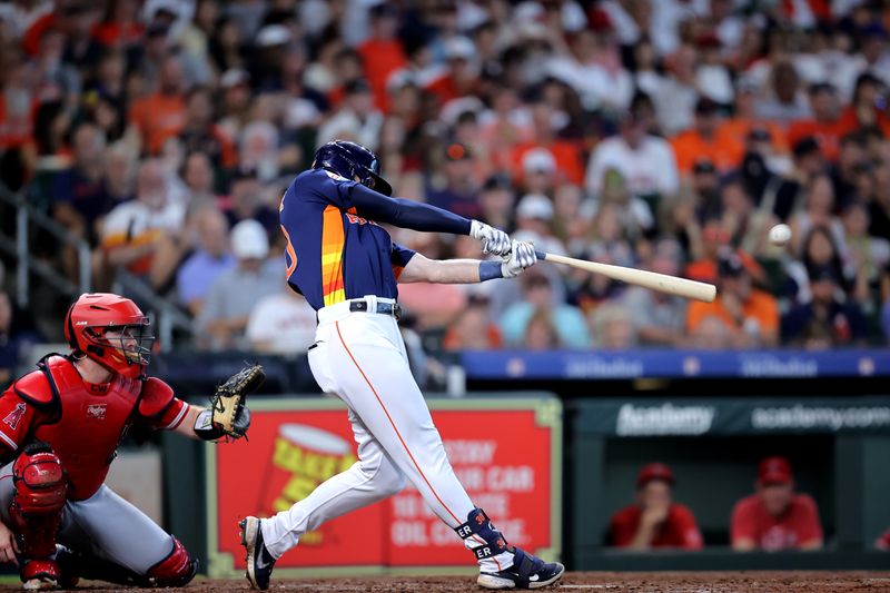 Aug 13, 2023; Houston, Texas, USA; Houston Astros right fielder Kyle Tucker (30) hits a double against the Los Angeles Angels during the fourth inning at Minute Maid Park. Mandatory Credit: Erik Williams-USA TODAY Sports