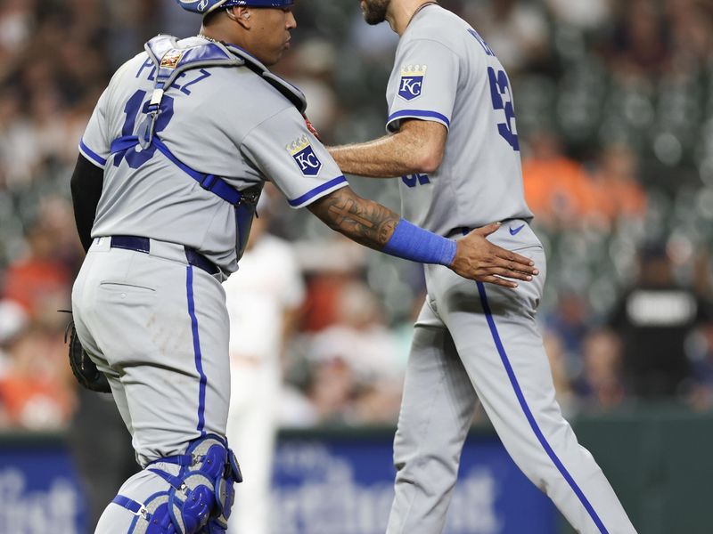 May 12, 2025; Houston, Texas, USA; Kansas City Royals catcher Salvador Perez (13) pats Kansas City Royals starting pitcher Michael Wacha (52) on the but after he comes out in the seventh inning against the Houston Astros at Daikin Park. Mandatory Credit: Thomas Shea-Imagn Images