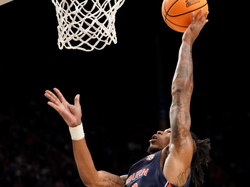 Mar 18, 2023; Birmingham, AL, USA; Auburn Tigers guard Allen Flanigan (22) shoots during the first half against the Houston Cougars at Legacy Arena. Mandatory Credit: Marvin Gentry-USA TODAY Sports