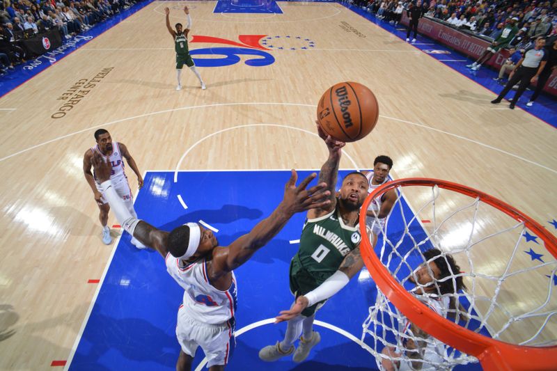 PHILADELPHIA, PA - FEBRUARY 25: Damian Lillard #0 of the Milwaukee Bucks drives to the basket during the game against the Philadelphia 76ers on February 25, 2024 at the Wells Fargo Center in Philadelphia, Pennsylvania NOTE TO USER: User expressly acknowledges and agrees that, by downloading and/or using this Photograph, user is consenting to the terms and conditions of the Getty Images License Agreement. Mandatory Copyright Notice: Copyright 2024 NBAE (Photo by Jesse D. Garrabrant/NBAE via Getty Images)