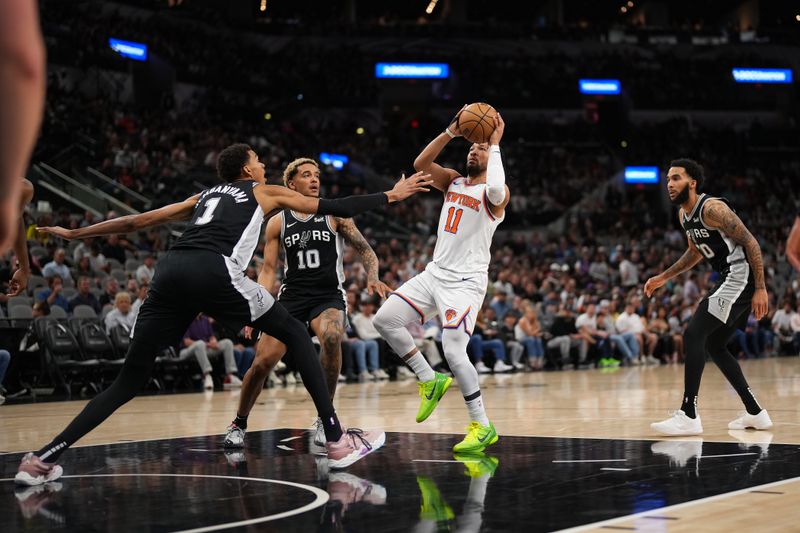 SAN ANTONIO, TX - MARCH 29:  Jalen Brunson #11 of the New York Knicks drives to the basket during the game against the San Antonio Spurs on March 29, 2024 at the Frost Bank Center in San Antonio, Texas. NOTE TO USER: User expressly acknowledges and agrees that, by downloading and or using this photograph, user is consenting to the terms and conditions of the Getty Images License Agreement. Mandatory Copyright Notice: Copyright 2024 NBAE (Photos by Darren Carroll/NBAE via Getty Images)