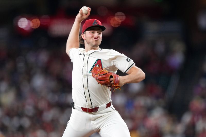 Sep 29, 2024; Phoenix, Arizona, USA; Arizona Diamondbacks pitcher Brandon Pfaadt (32) pitches against the San Diego Padres during the third inning at Chase Field. Mandatory Credit: Joe Camporeale-Imagn Images