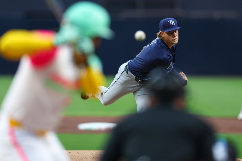 Apr 25, 2025; San Diego, California, USA; Tampa Bay Rays starting pitcher Shane Baz (11) pitches during the first inning against the San Diego Padres at Petco Park. Mandatory Credit: Chadd Cady-Imagn Images