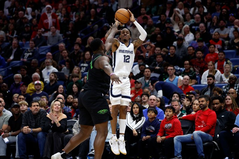 NEW ORLEANS, LOUISIANA - DECEMBER 19: Ja Morant #12 of the Memphis Grizzlies shoots the ball over Zion Williamson #1 of the New Orleans Pelicans at Smoothie King Center on December 19, 2023 in New Orleans, Louisiana.  NOTE TO USER: User expressly acknowledges and agrees that, by downloading and or using this photograph, User is consenting to the terms and conditions of the Getty Images License Agreement. (Photo by Chris Graythen/Getty Images)