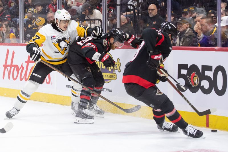 Dec 14, 2024; Ottawa, Ontario, CAN; Ottawa Senators center Tim Stutzle (18) recovers the puck following a battle between right wing Claude Giroux (28) and Pittsburgh Penguins defenseman Ryan Graves (27) in the first period at the Canadian Tire Centre. Mandatory Credit: Marc DesRosiers-Imagn Images