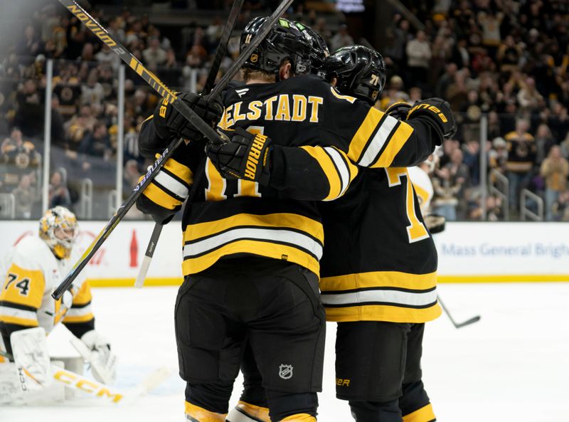 Jan 11, 2026; Boston, Massachusetts, USA; Boston Bruins left-winger Viktor Arvidsson (71) celebrates a score during the first period of the game against the Pittsburgh Penguins at TD Garden. Mandatory Credit: Natalie Reid-Imagn Images