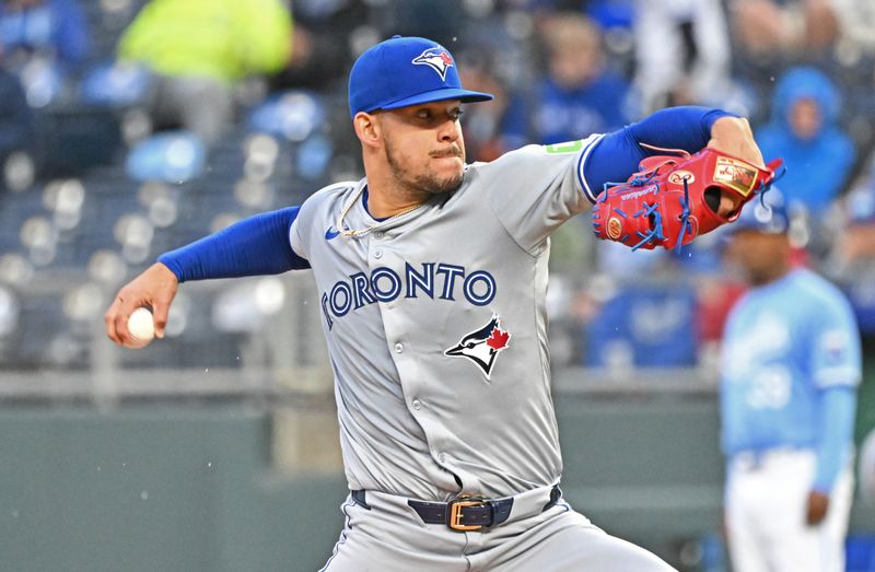 Apr 25, 2024; Kansas City, Missouri, USA;  Toronto Blue Jays starting pitcher Jose Berrios (17) delivers a pitch in the first inning against the Kansas City Royals at Kauffman Stadium. Mandatory Credit: Peter Aiken-USA TODAY Sports