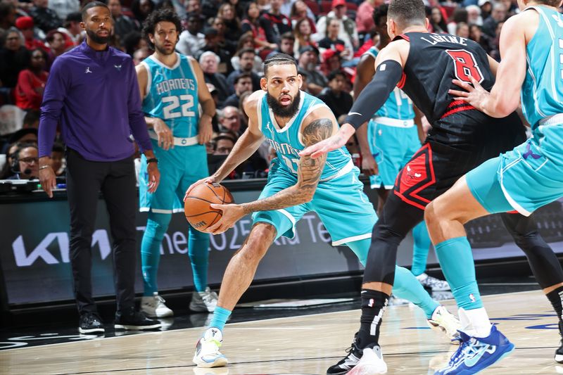 CHICAGO, IL - JANUARY 17: Cody Martin #11 of the Charlotte Hornets handles the ball during the game against the Chicago Bulls on January 17, 2025 at United Center in Chicago, Illinois. NOTE TO USER: User expressly acknowledges and agrees that, by downloading and or using this photograph, User is consenting to the terms and conditions of the Getty Images License Agreement. Mandatory Copyright Notice: Copyright 2025 NBAE (Photo by Jeff Haynes/NBAE via Getty Images)