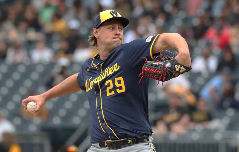 May 25, 2025; Pittsburgh, Pennsylvania, USA;  Milwaukee Brewers relief pitcher Trevor Megill (29) pitches against the Pittsburgh Pirates during the ninth inning at PNC Park. Mandatory Credit: Charles LeClaire-Imagn Images
