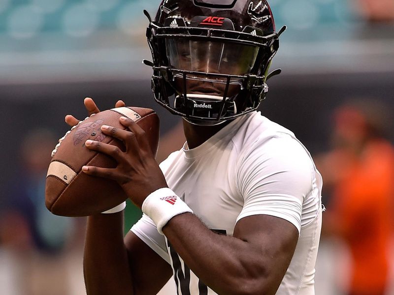 Nov 9, 2019; Miami Gardens, FL, USA; Louisville Cardinals quarterback Micale Cunningham (3) warms up before a game against the Miami Hurricanes at Hard Rock Stadium. Mandatory Credit: Steve Mitchell-USA TODAY Sports