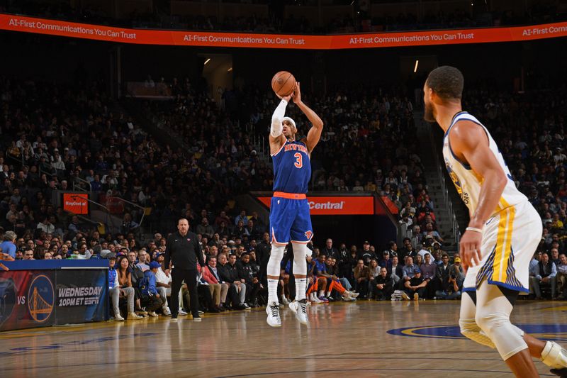 SAN FRANCISCO, CA - MARCH 18: Josh Hart #3 of the New York Knicks shoots a three point basket during the game against the Golden State Warriors on MARCH 18, 2024 at Chase Center in San Francisco, California. NOTE TO USER: User expressly acknowledges and agrees that, by downloading and or using this photograph, user is consenting to the terms and conditions of Getty Images License Agreement. Mandatory Copyright Notice: Copyright 2024 NBAE (Photo by Noah Graham/NBAE via Getty Images)