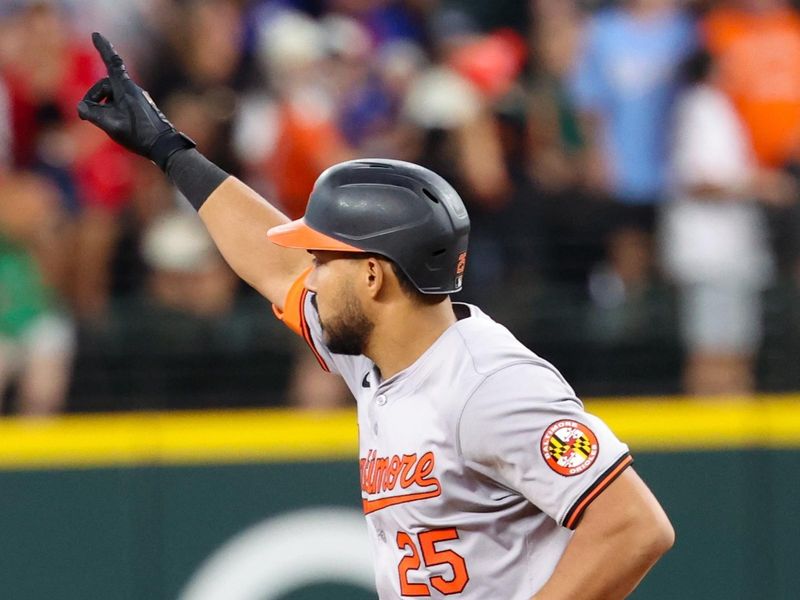 Jul 21, 2024; Arlington, Texas, USA;  Baltimore Orioles right fielder Anthony Santander (25) reacts after hitting a two run home run during the eighth inning against the Texas Rangers at Globe Life Field. Mandatory Credit: Kevin Jairaj-USA TODAY Sports