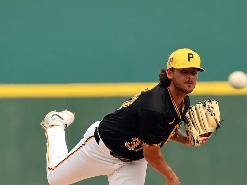 Mar 5, 2024; Bradenton, Florida, USA;  Pittsburgh Pirates starting pitcher Jared Jones (37) throws a pitch during the first inning against the Toronto Blue Jays at LECOM Park. Mandatory Credit: Kim Klement Neitzel-USA TODAY Sports