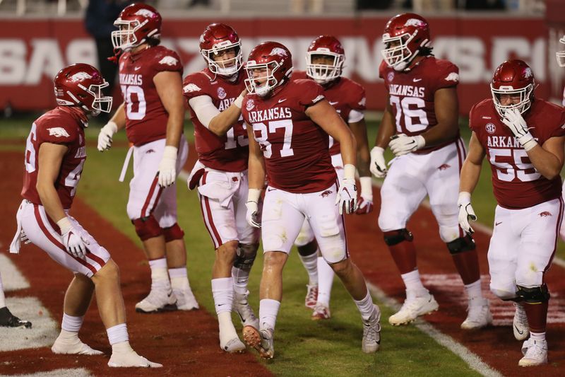 Nov 7, 2020; Fayetteville, Arkansas, USA; Arkansas Razorbacks tight end Blake Kern (87) celebrates with teammates after scoring a touchdown against the Tennessee Volunteers at Donald W. Reynolds Razorback Stadium. Arkansas won 24-13. Mandatory Credit: Nelson Chenault-USA TODAY Sports