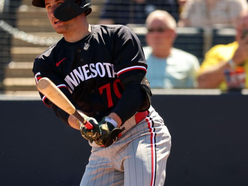 Feb 26, 2024; Tampa, Florida, USA; Minnesota Twins infielder Anthony Prado (70) doubles during the second inning against the New York Yankees  at George M. Steinbrenner Field. Mandatory Credit: Kim Klement Neitzel-USA TODAY Sports