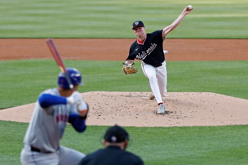 Jun 4, 2024; Washington, District of Columbia, USA; Washington Nationals starting pitcher D J Herz (74) pitches against New York Mets third base Mark Vientos (27) during the second inning at Nationals Park. Mandatory Credit: Geoff Burke-USA TODAY Sports