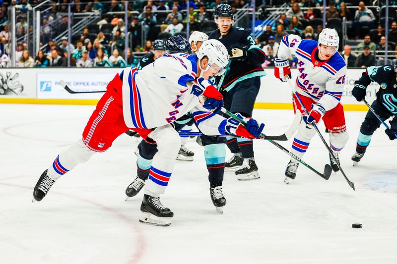 Nov 17, 2024; Seattle, Washington, USA; New York Rangers center Adam Edstrom (84) shoots the puck against the Seattle Kraken during the second period at Climate Pledge Arena. Mandatory Credit: Joe Nicholson-Imagn Images