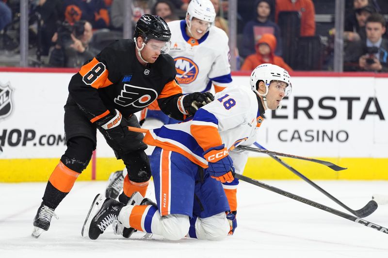 Apr 12, 2025; Philadelphia, Pennsylvania, USA; Philadelphia Flyers defenseman Cam York (8) attempts to free his stick against New York Islanders left wing Pierre Engvall (18) in the first period at Wells Fargo Center. Mandatory Credit: Kyle Ross-Imagn Images