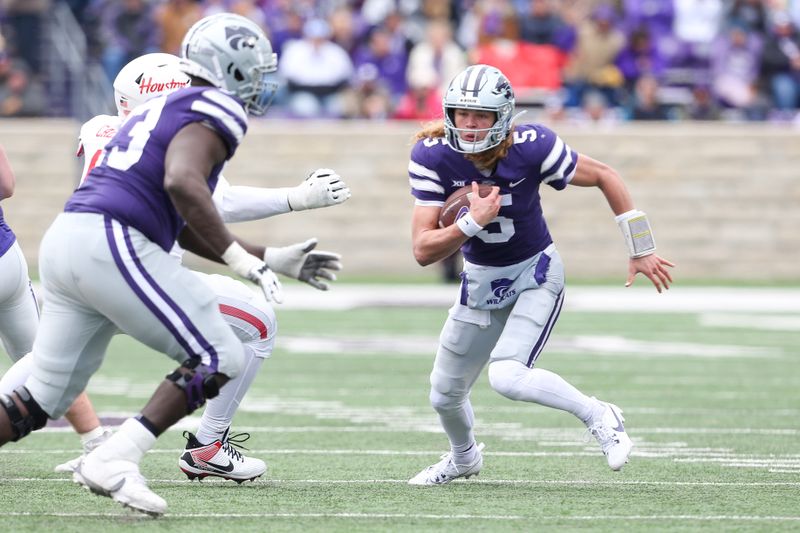 Oct 28, 2023; Manhattan, Kansas, USA; Kansas State Wildcats quarterback Avery Johnson (5) runs the ball during the fourth quarter against the Houston Cougars at Bill Snyder Family Football Stadium. Mandatory Credit: Scott Sewell-USA TODAY Sports