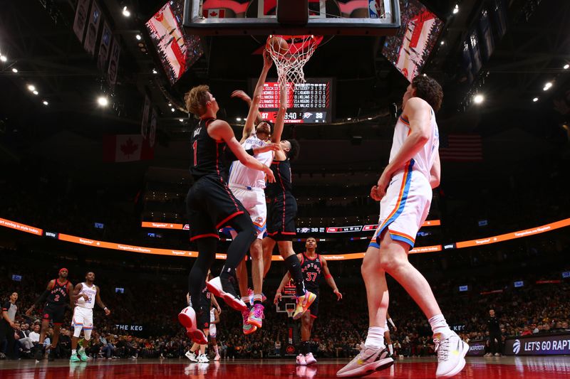 TORONTO, CANADA - MARCH 22:  Chet Holmgren #7 of the Oklahoma City Thunder goes to the basket during the game on March 22, 2024 at the Scotiabank Arena in Toronto, Ontario, Canada.  NOTE TO USER: User expressly acknowledges and agrees that, by downloading and or using this Photograph, user is consenting to the terms and conditions of the Getty Images License Agreement.  Mandatory Copyright Notice: Copyright 2024 NBAE (Photo by Vaughn Ridley/NBAE via Getty Images)