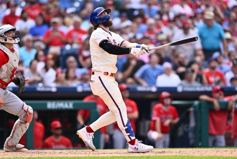 Aug 30, 2023; Philadelphia, Pennsylvania, USA; Philadelphia Phillies first baseman Bryce Harper (3) hits a two-run home run against the Los Angeles Angels in the eighth inning at Citizens Bank Park. Mandatory Credit: Kyle Ross-USA TODAY Sports