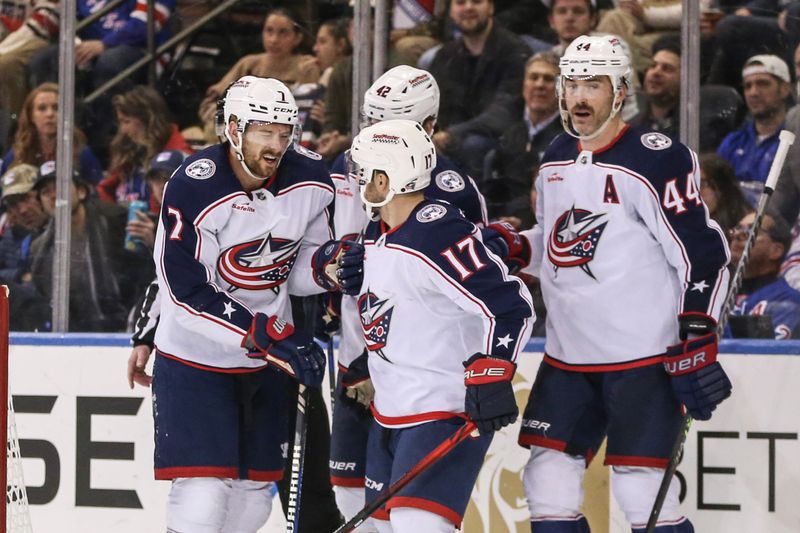 Nov 12, 2023; New York, New York, USA;  Columbus Blue Jackets center Sean Kuraly (7) reacts after getting injured after scoring a goal in the second period against the New York Rangers at Madison Square Garden. Mandatory Credit: Wendell Cruz-USA TODAY Sports