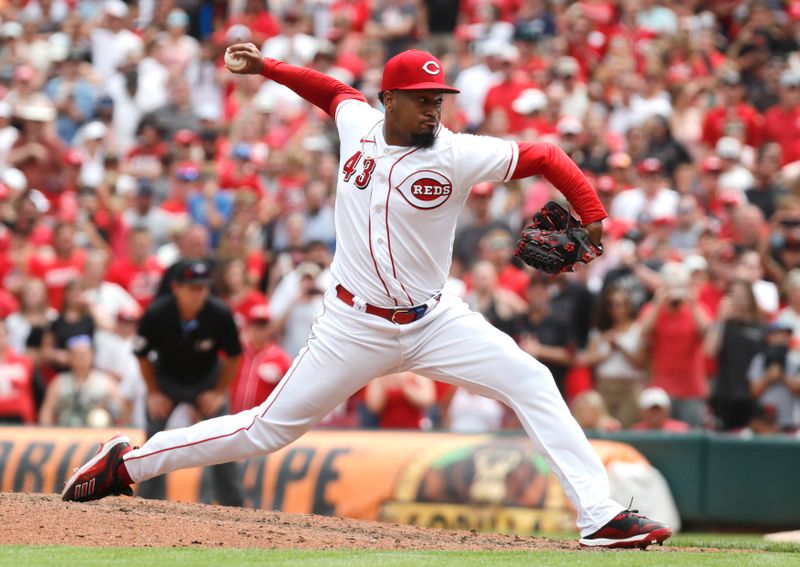 Jul 2, 2023; Cincinnati, Ohio, USA; Cincinnati Reds relief pitcher Alexis Diaz (43) throws against the San Diego Padres during the ninth inning at Great American Ball Park. Mandatory Credit: David Kohl-USA TODAY Sports