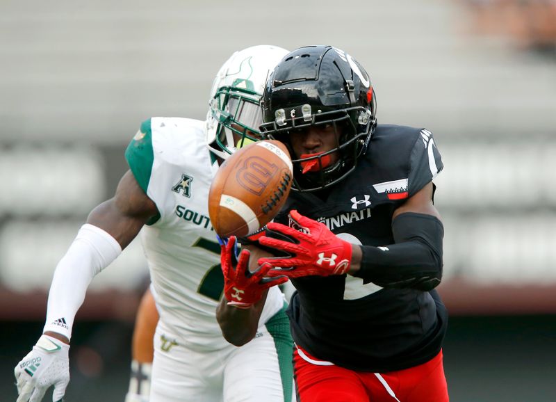 Oct 3, 2020; Cincinnati, OH, USA; Cincinnati Bearcats wide receiver Jayshon Jackson (2) makes the juggling catch during the third quarter against the South Florida Bulls at Nippert Stadium. Mandatory Credit: Joseph Maiorana-USA TODAY Sports