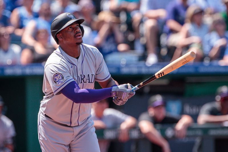 Jun 3, 2023; Kansas City, Missouri, USA; Colorado Rockies third baseman Elehuris Montero (44) watches the ball after hitting a triple during the first inning against the Kansas City Royals at Kauffman Stadium. Mandatory Credit: William Purnell-USA TODAY Sports