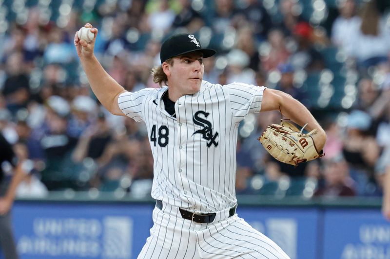 Aug 13, 2024; Chicago, Illinois, USA; Chicago White Sox starting pitcher Jonathan Cannon (48) delivers a pitch against the New York Yankees during the first inning at Guaranteed Rate Field. Mandatory Credit: Kamil Krzaczynski-USA TODAY Sports