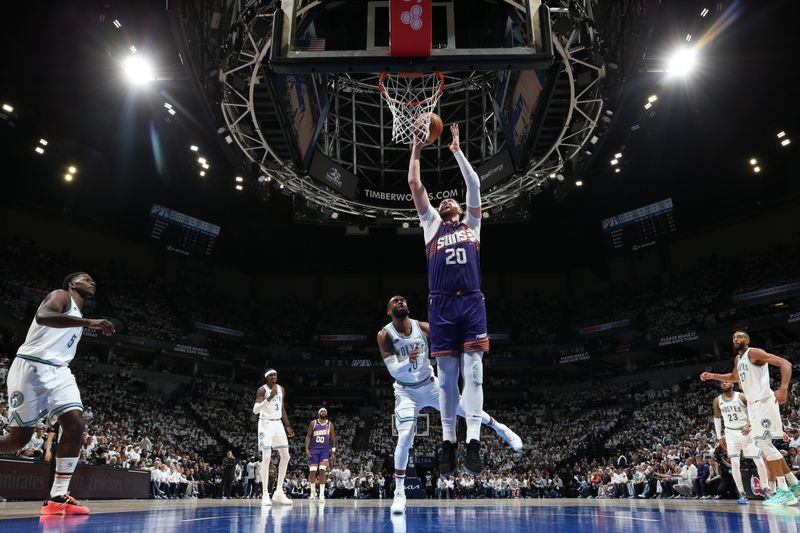 MINNEAPOLIS, MN -  APRIL 20: Jusuf Nurkic #20 of the Phoenix Suns dunks the ball during the game against the Minnesota Timberwolves during Round 1 Game 1 of the 2024 NBA Playoffs on April 20, 2024 at Target Center in Minneapolis, Minnesota. NOTE TO USER: User expressly acknowledges and agrees that, by downloading and or using this Photograph, user is consenting to the terms and conditions of the Getty Images License Agreement. Mandatory Copyright Notice: Copyright 2024 NBAE (Photo by David Sherman/NBAE via Getty Images)