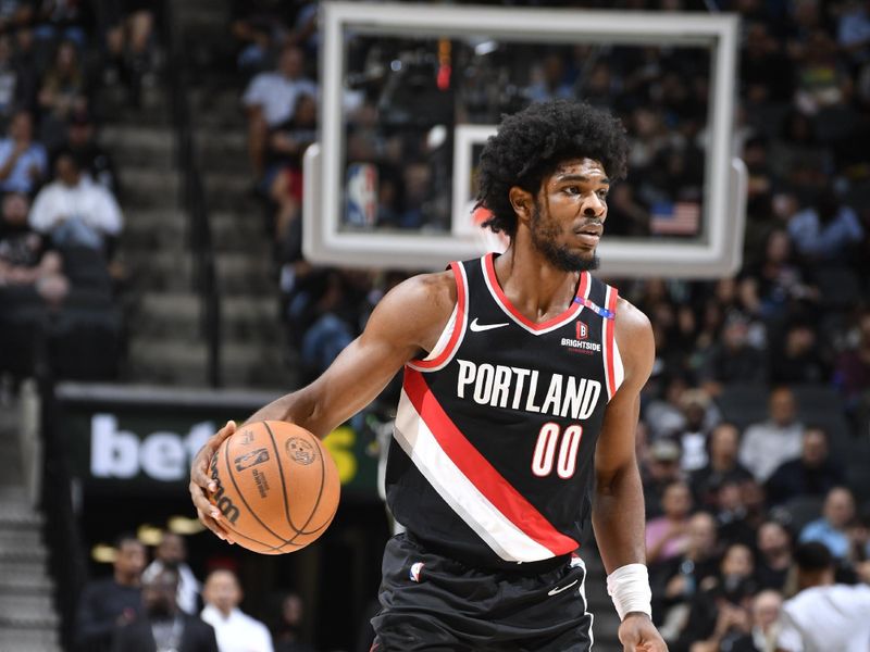 SAN ANTONIO, TX - NOVEMBER 7: Scoot Henderson #00 of the Portland Trail Blazers dribbles the ball during the game against the San Antonio Spurs on November 7, 2024 at the Frost Bank Center in San Antonio, Texas. NOTE TO USER: User expressly acknowledges and agrees that, by downloading and or using this photograph, user is consenting to the terms and conditions of the Getty Images License Agreement. Mandatory Copyright Notice: Copyright 2024 NBAE (Photos by Logan Riely/NBAE via Getty Images)