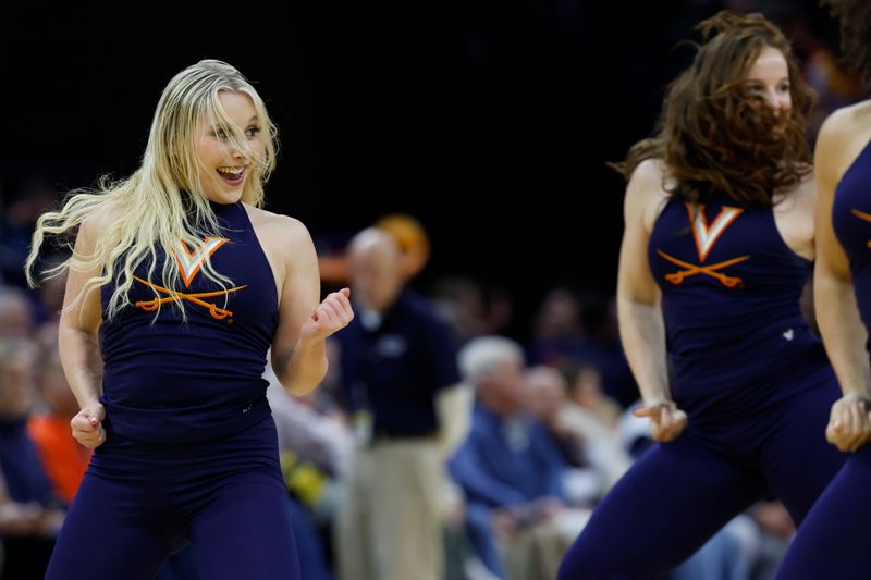 Jan 24, 2024; Charlottesville, Virginia, USA; Members of the Virginia Cavaliers Dance Team dance during a timeout against the North Carolina State Wolfpack in the second half at John Paul Jones Arena. Mandatory Credit: Geoff Burke-USA TODAY Sports