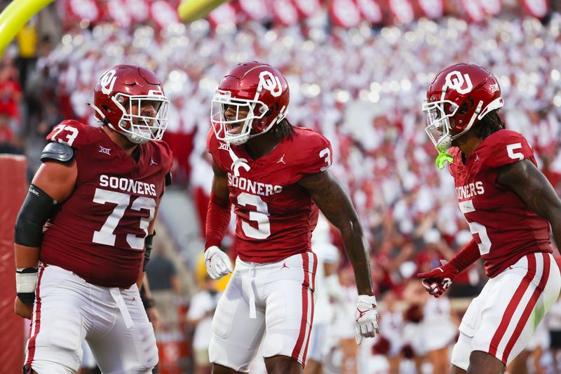 Sep 9, 2023; Norman, Oklahoma, USA;  Oklahoma Sooners wide receiver Jalil Farooq (3) celebrates with Oklahoma Sooners offensive lineman Andrew Raym (73) and Oklahoma Sooners wide receiver Andrel Anthony (5) after scoring a touchdown during the fourth quarter against the Southern Methodist Mustangs at Gaylord Family-Oklahoma Memorial Stadium. Mandatory Credit: Kevin Jairaj-USA TODAY Sports