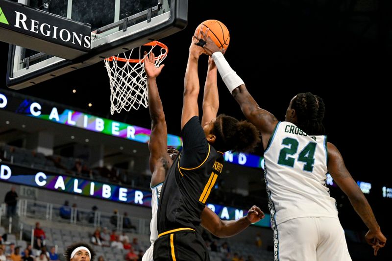 Mar 10, 2023; Fort Worth, TX, USA; Tulane Green Wave forward Kevin Cross (24) blocks a shot by Wichita State Shockers forward Kenny Pohto (11) during the first half at Dickies Arena. Mandatory Credit: Jerome Miron-USA TODAY Sports