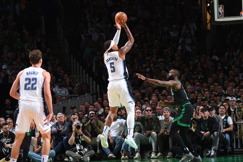 BOSTON, MA - APRIL 29:   Paolo Banchero #5 of the Orlando Magic shoots the ball during the game against the Boston Celtics  during Round 1 Game 5 of the 2025 NBA Playoffs on April 29, 2025 at TD Garden in Boston, Massachusetts. NOTE TO USER: User expressly acknowledges and agrees that, by downloading and/or using this Photograph, user is consenting to the terms and conditions of the Getty Images License Agreement. Mandatory Copyright Notice: Copyright 2025 NBAE (Photo by Brian Babineau/NBAE via Getty Images)