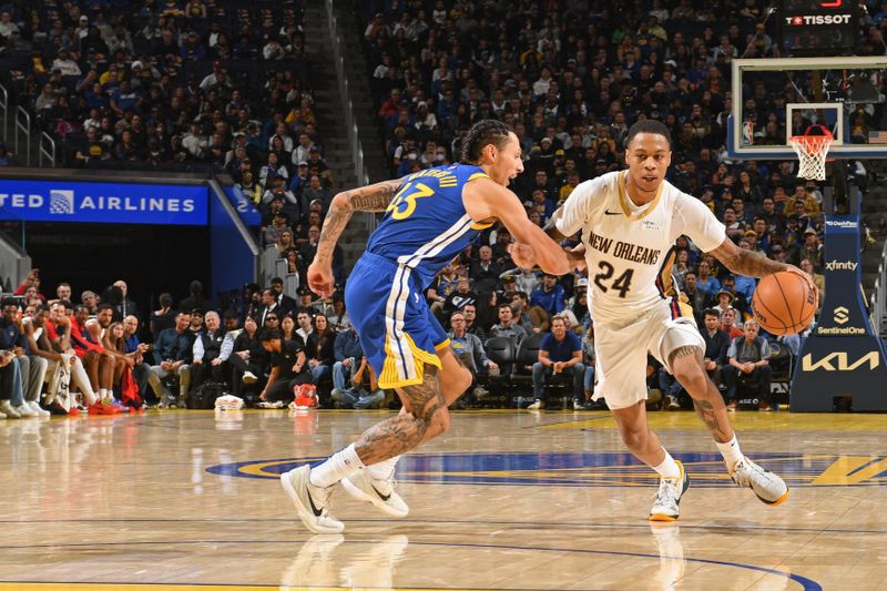 SAN FRANCISCO, CA - OCTOBER 30: Jordan Hawkins #24 of the New Orleans Pelicans dribbles the ball during the game against the Golden State Warriors on October 30, 2024 at Chase Center in San Francisco, California. NOTE TO USER: User expressly acknowledges and agrees that, by downloading and or using this photograph, user is consenting to the terms and conditions of Getty Images License Agreement. Mandatory Copyright Notice: Copyright 2024 NBAE (Photo by Noah Graham/NBAE via Getty Images)