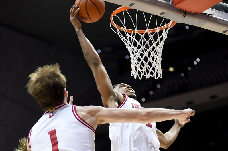 Mar 4, 2026; Bloomington, Indiana, USA; Indiana Hoosiers guard Nick Dorn (7) makes a basket against the Minnesota Golden Gophers during the first half at Simon Skjodt Assembly Hall. Mandatory Credit: Robert Goddin-Imagn Images