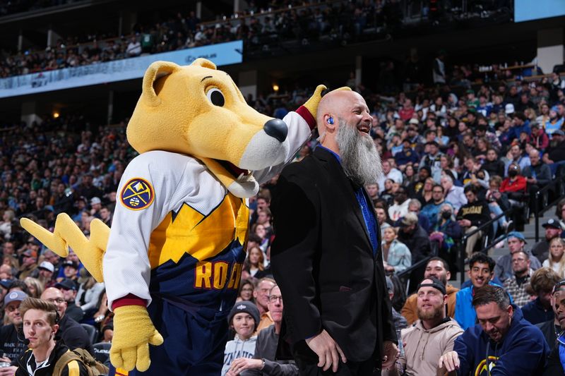 DENVER, CO - JANUARY 1: Mascot Rocky the Mountain Lion of the Denver Nuggets stands on the court with security personnel while the basket is adjusted on January 1, 2023 at the Ball Arena in Denver, Colorado. NOTE TO USER: User expressly acknowledges and agrees that, by downloading and/or using this Photograph, user is consenting to the terms and conditions of the Getty Images License Agreement. Mandatory Copyright Notice: Copyright 2022 NBAE (Photo by Garrett Ellwood/NBAE via Getty Images)