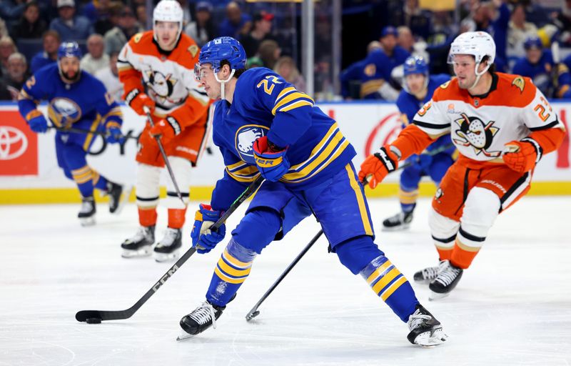 Feb 25, 2025; Buffalo, New York, USA;  Buffalo Sabres right wing Jack Quinn (22) takes a shot on goal during the second period against the Anaheim Ducks at KeyBank Center. Mandatory Credit: Timothy T. Ludwig-Imagn Images