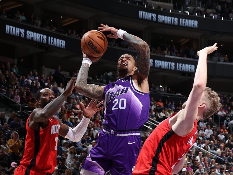 SALT LAKE CITY, UT - MARCH 29: John Collins #20 of the Utah Jazz drives to the basket during the game against the Houston Rockets on March 29, 2024 at Delta Center in Salt Lake City, Utah. NOTE TO USER: User expressly acknowledges and agrees that, by downloading and or using this Photograph, User is consenting to the terms and conditions of the Getty Images License Agreement. Mandatory Copyright Notice: Copyright 2024 NBAE (Photo by Melissa Majchrzak/NBAE via Getty Images)