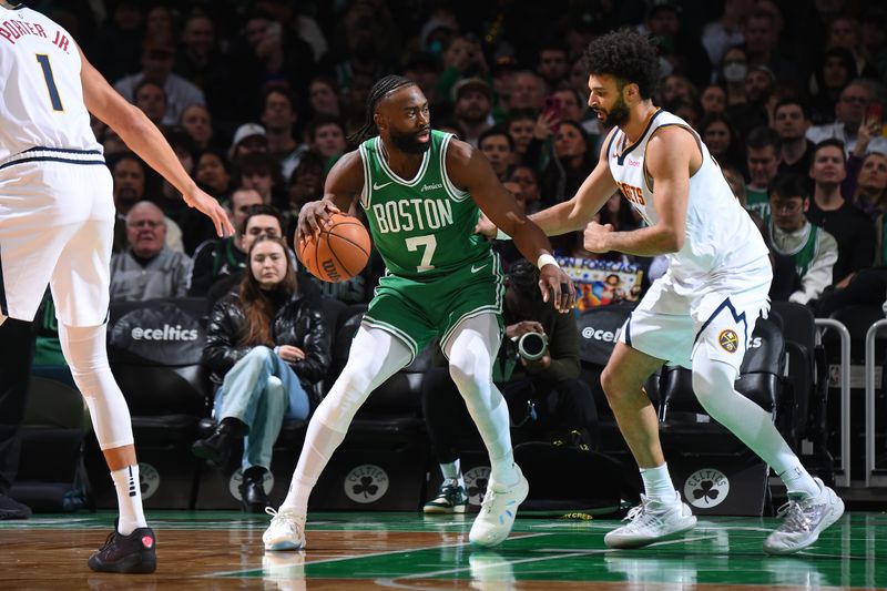 BOSTON, MA - MARCH 2: Jaylen Brown #7 of the Boston Celtics handles the ball while Jamal Murray #27 of the Denver Nuggets plays defense during the game on March 2, 2025 at TD Garden in Boston, Massachusetts. NOTE TO USER: User expressly acknowledges and agrees that, by downloading and/or using this Photograph, user is consenting to the terms and conditions of the Getty Images License Agreement. Mandatory Copyright Notice: Copyright 2025 NBAE (Photo by Brian Babineau/NBAE via Getty Images)