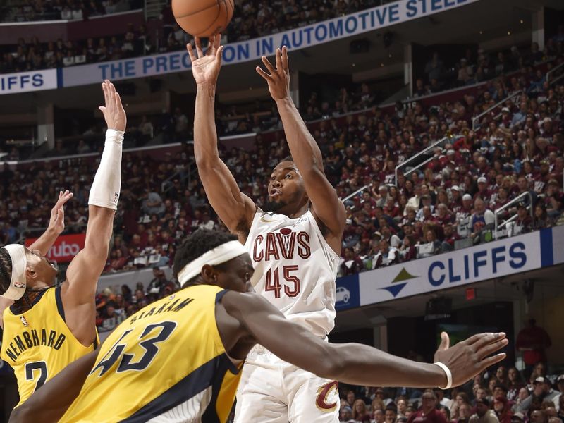 CLEVELAND, OH - MAY 4: Donovan Mitchell #45 of the Cleveland Cavaliers shoots a three point basket during the game against the Indiana Pacers during Round 2 Game 1 of the 2025 NBA Playoffs on May 4, 2025 at Rocket Arena in Cleveland, Ohio. NOTE TO USER: User expressly acknowledges and agrees that, by downloading and/or using this Photograph, user is consenting to the terms and conditions of the Getty Images License Agreement. Mandatory Copyright Notice: Copyright 2025 NBAE (Photo by David Liam Kyle/NBAE via Getty Images)